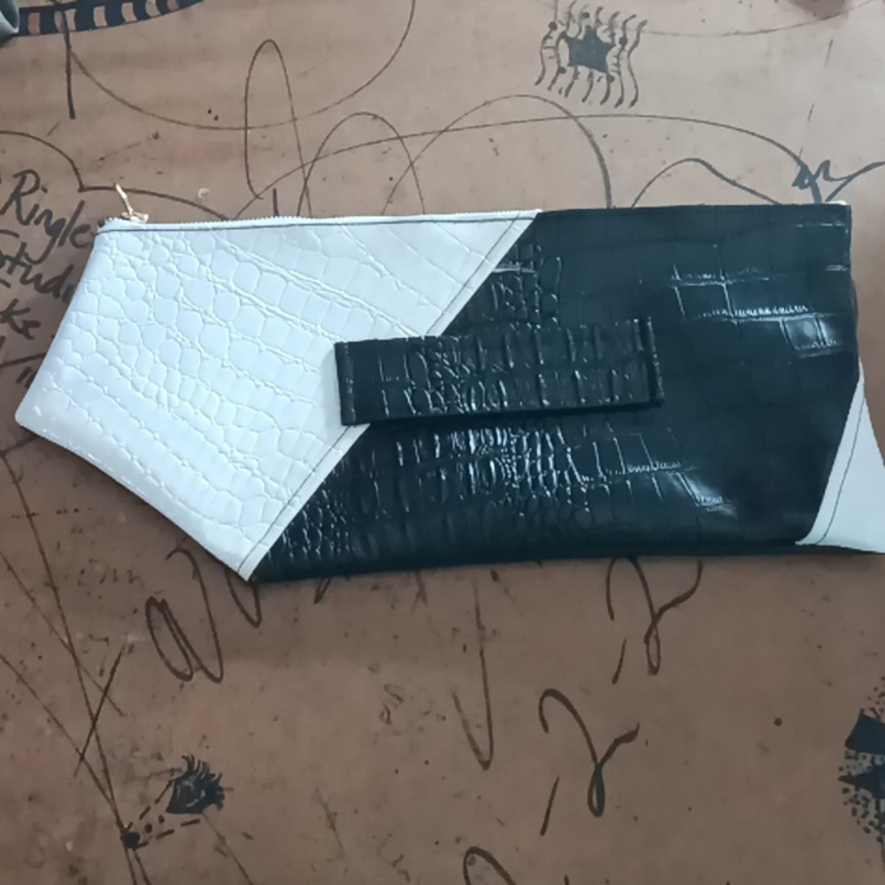 Black and white clutch w/ strap